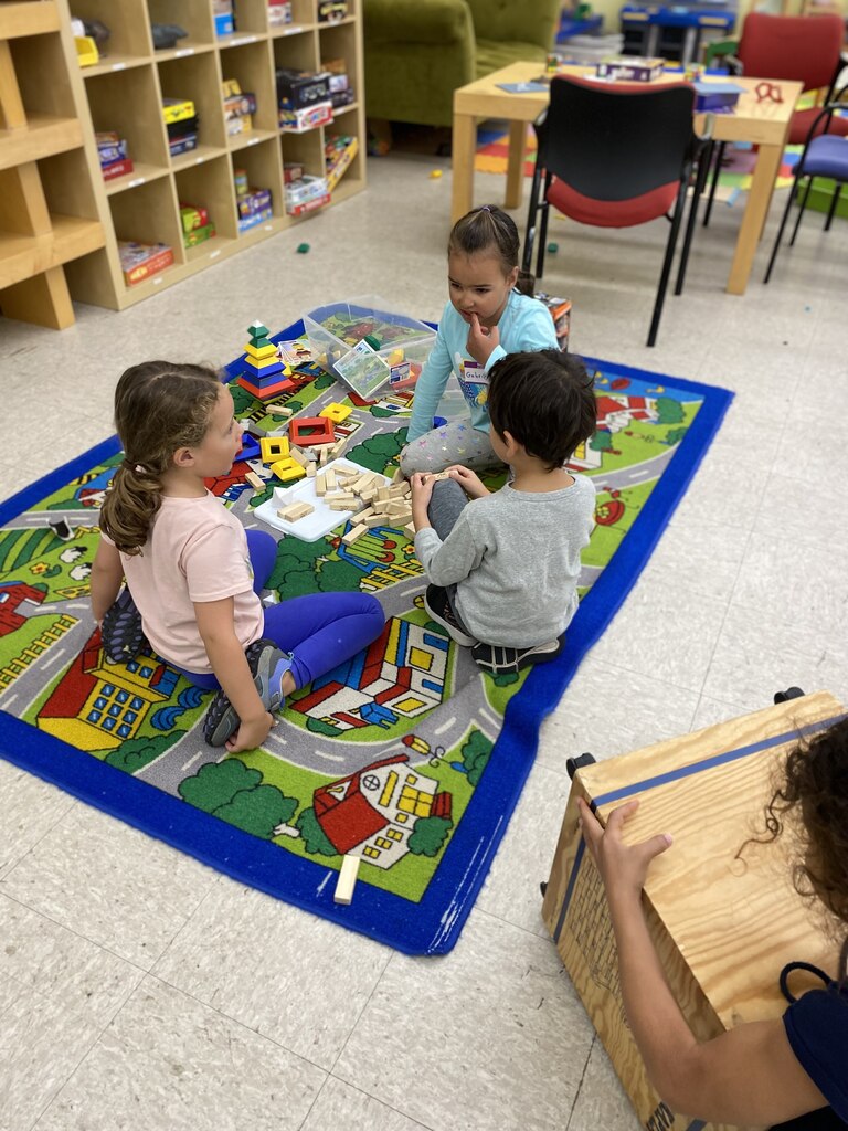 Kids Playing on Rug